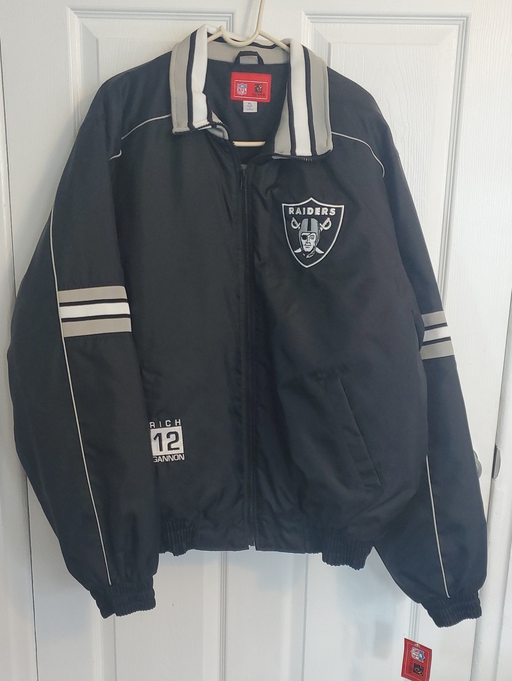 Vintage NFL Black Raiders Bomber Jacket with White Stripe Accents